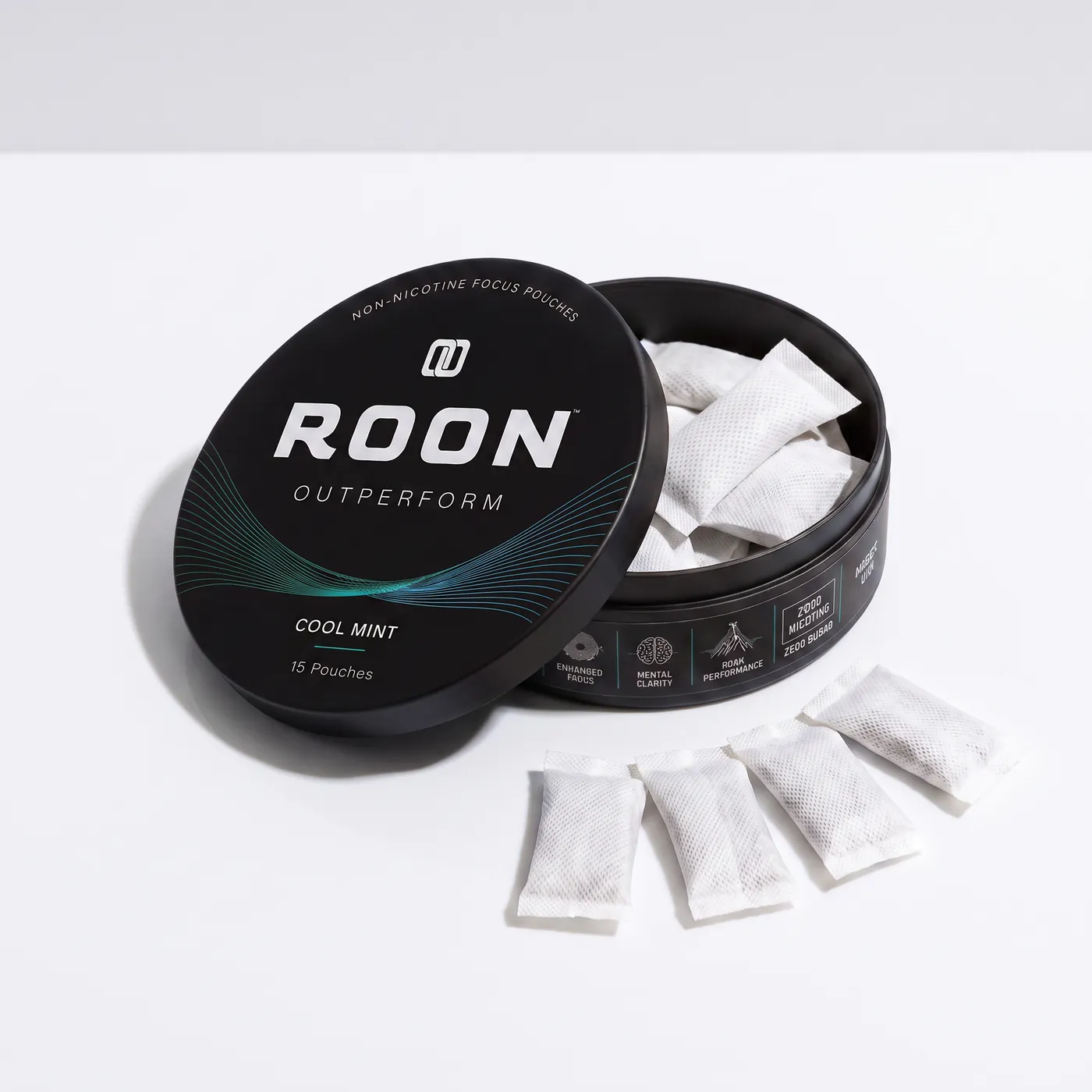 An open tin of Roon Cool Mint with four pouches fanned beside it, labelled with the caffeine, L-theanine, Dynamine and TeaCrine amounts per pouch.