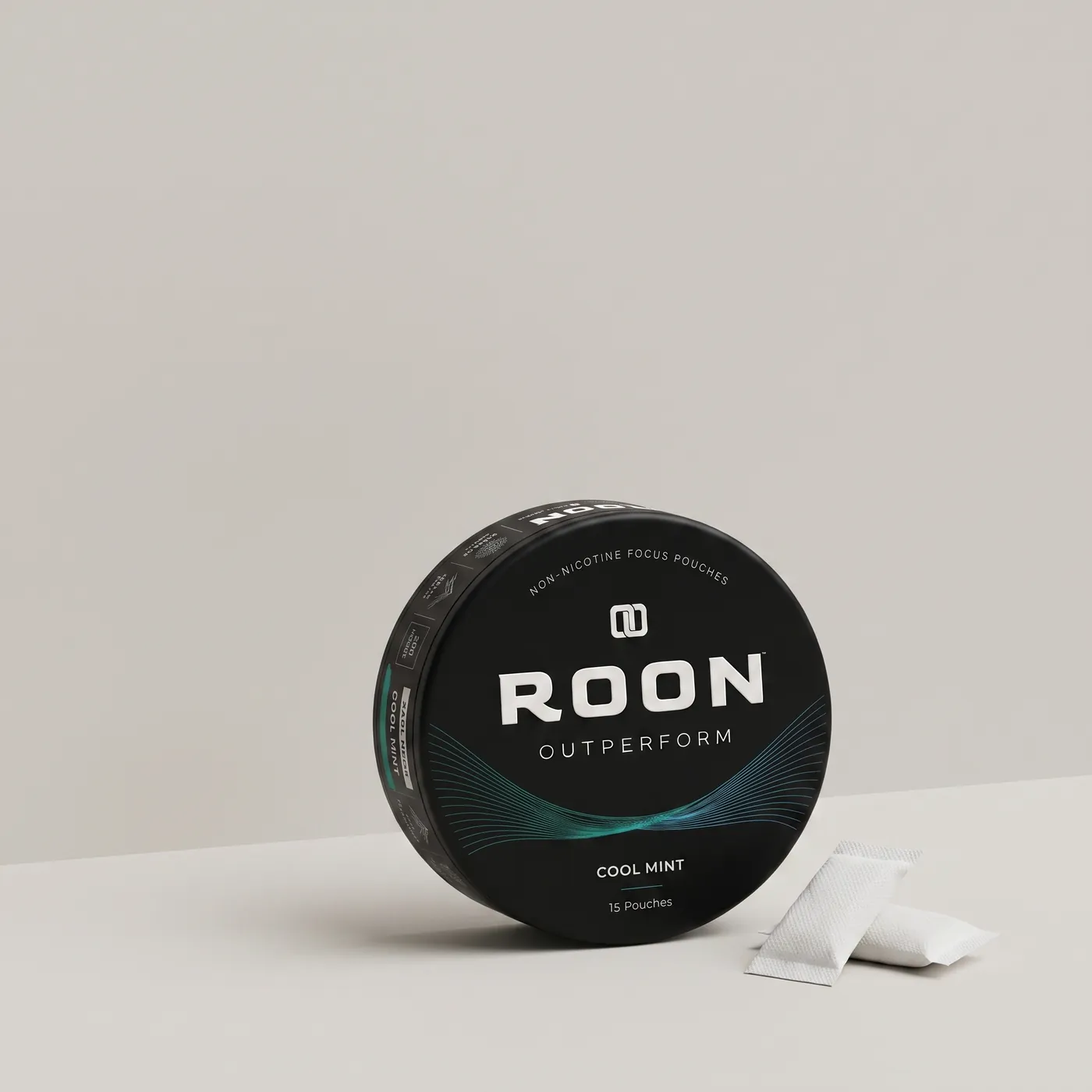 A closed tin of Roon Cool Mint pouches beside a sheet showing third-party testing and manufacturing details.