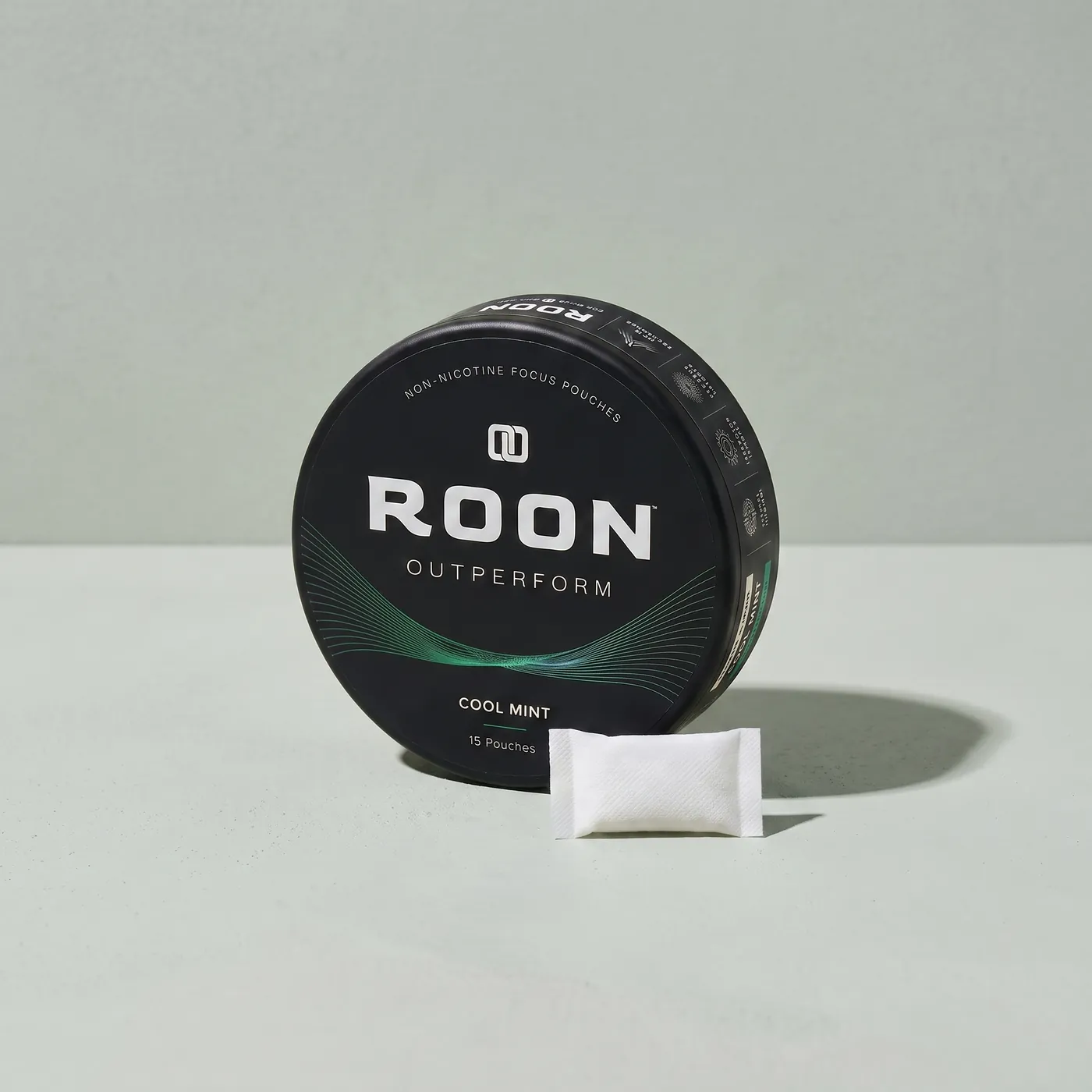A single Roon pouch beside a diagram showing where the pouch rests against the gum.