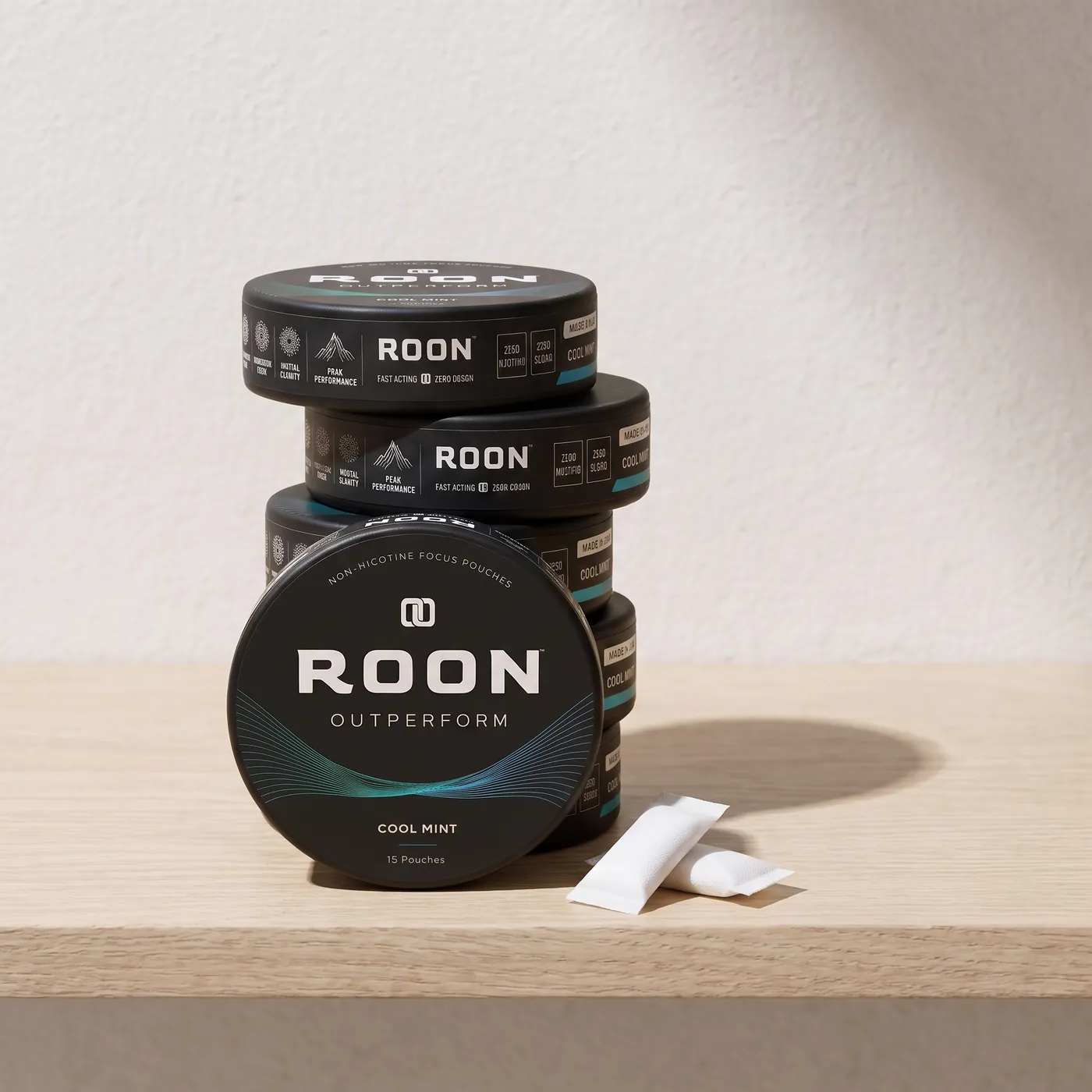 Four stacked tins of Roon Cool Mint focus pouches, showing the multi-tin subscription options.