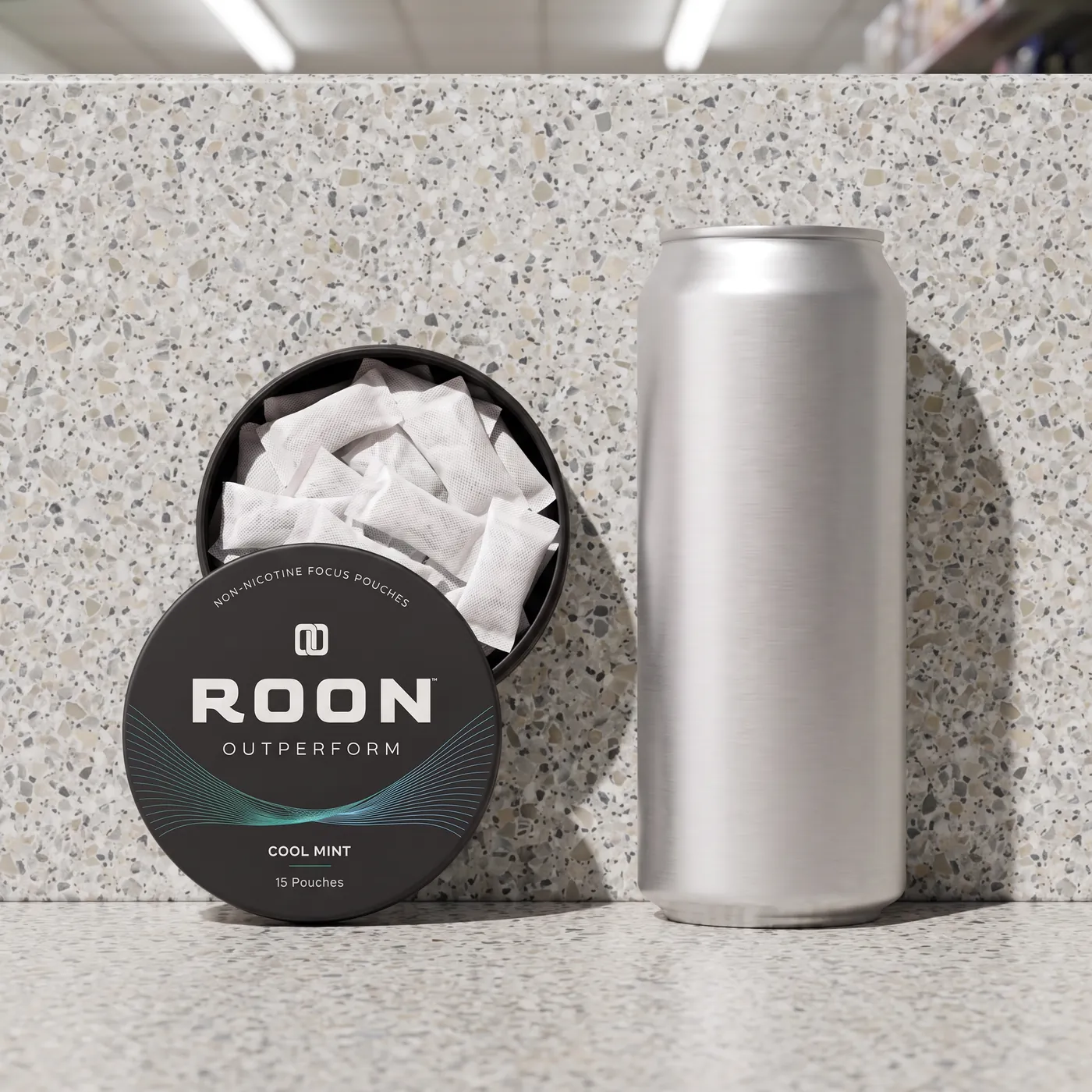 An open tin of Roon caffeine pouches in front of a plain slim energy drink can, comparing the two formats.
