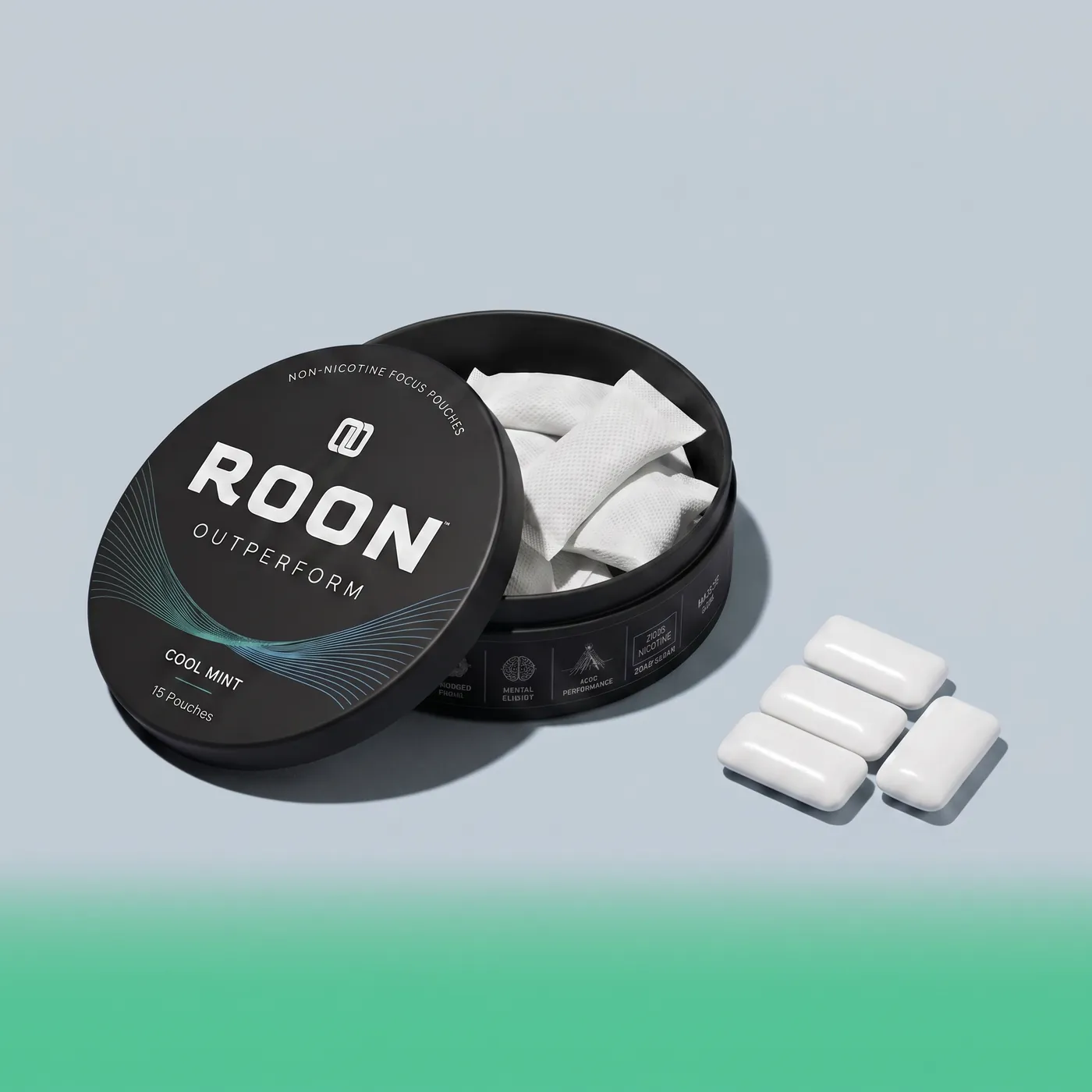 An open tin of Roon caffeine pouches next to pieces of caffeine gum, comparing the two formats.