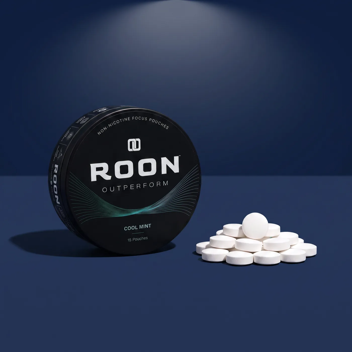 An open tin of Roon caffeine pouches next to loose caffeine tablets, comparing the two formats.